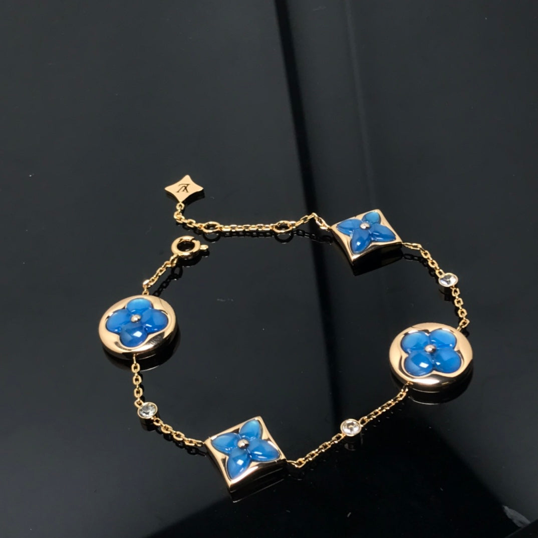 [BSNL Jewels]Armband mit Stern und Sonne, 4 Motiven, blau